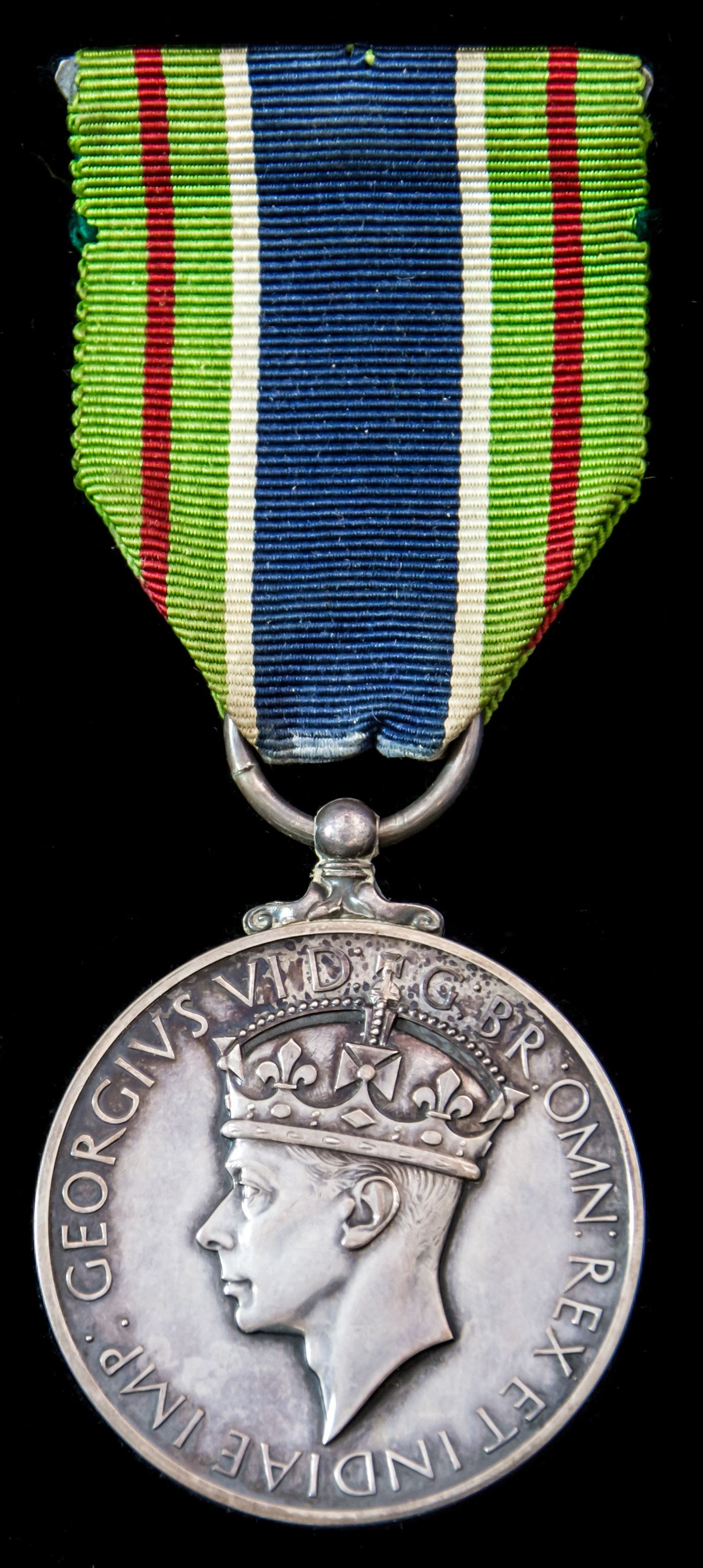 Colonial Police Medal with reverse for Gallantry, GVI 1st type bust, unnamed as sometimes issued,...