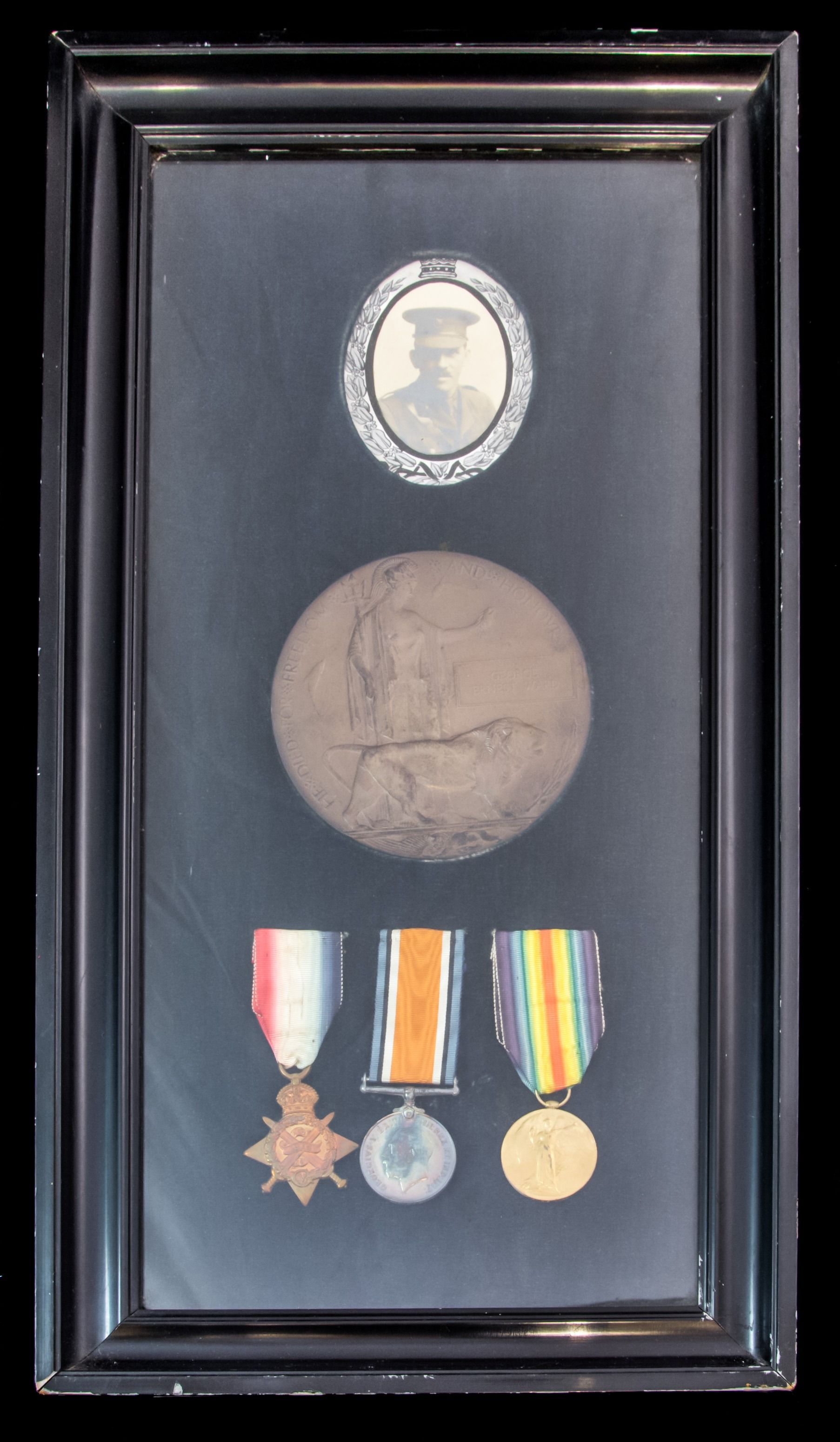 An emotive First Day of Loos Great War 1914 Star trio and Memorial Plaque awarded to Captain G.E....