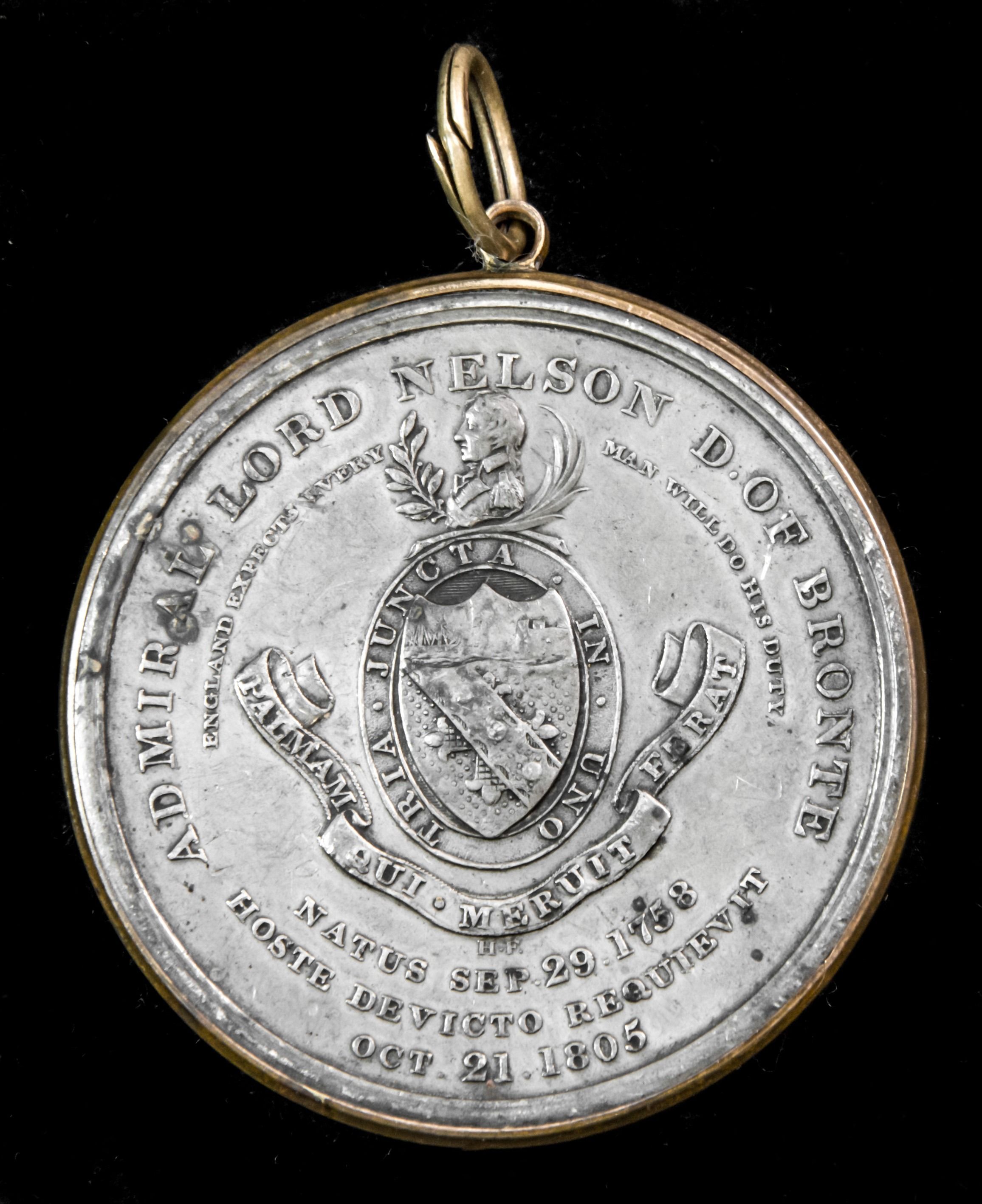 A fine example of the Davison’s Trafalgar Medal 1805, Pewter with contemporary brass frame, compl...